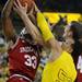 Michigan junior Jordan Morgan fights Indiana freshman Jeremy Hollowell and sophomore Cody Zeller during the first half at Crisler Center on Sunday, March 10, 2013. Melanie Maxwell I AnnArbor.com